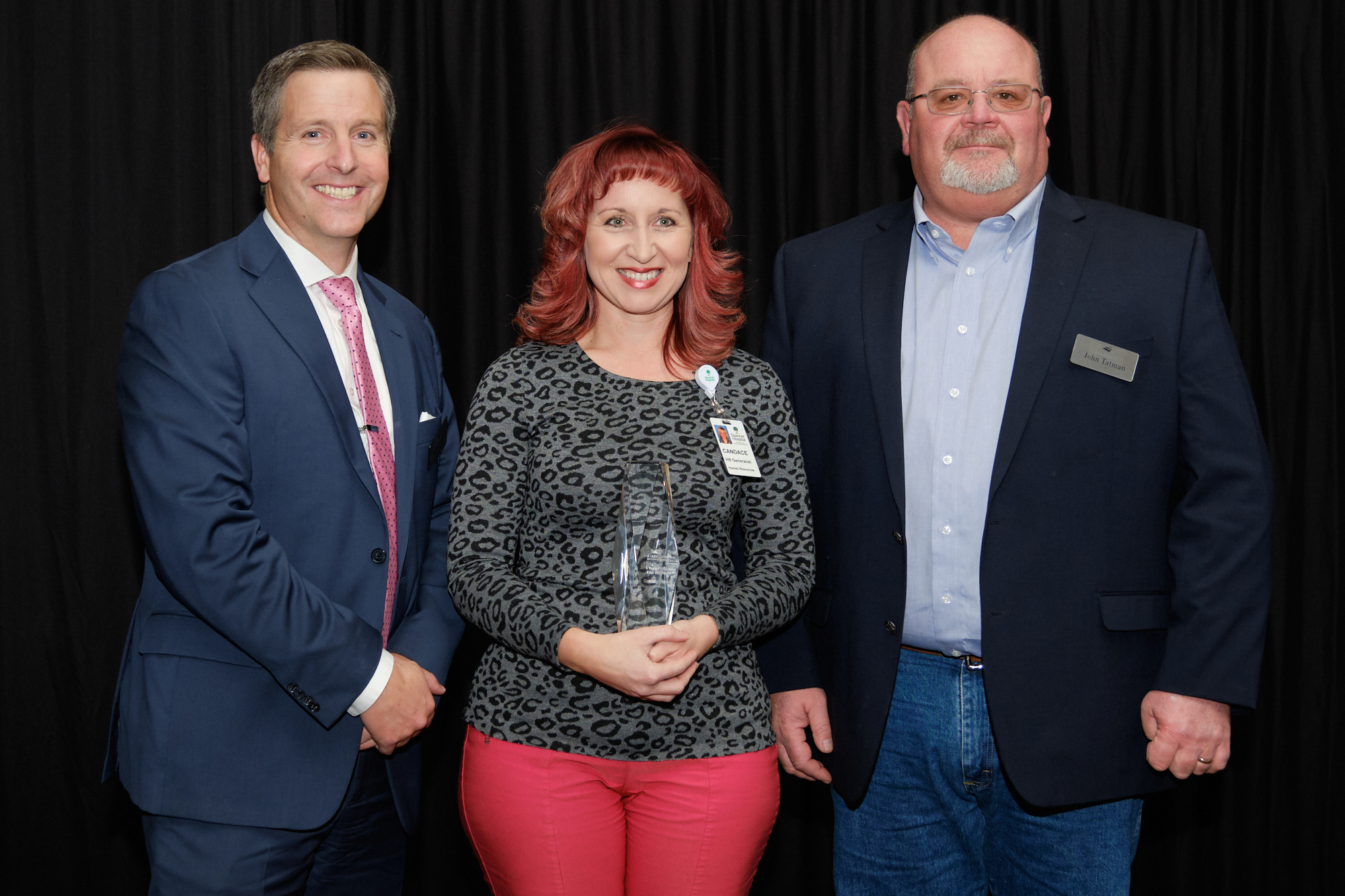 L to R: Corridor CEO Kiley Miller, 2019 Young Professional of the Year Candace Daniels (Spencer Hospital), Corridor Board Chair John Tatman