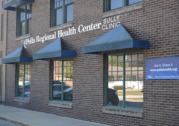 Pella Regional Health Center's Medical Clinic in Sully's Logo