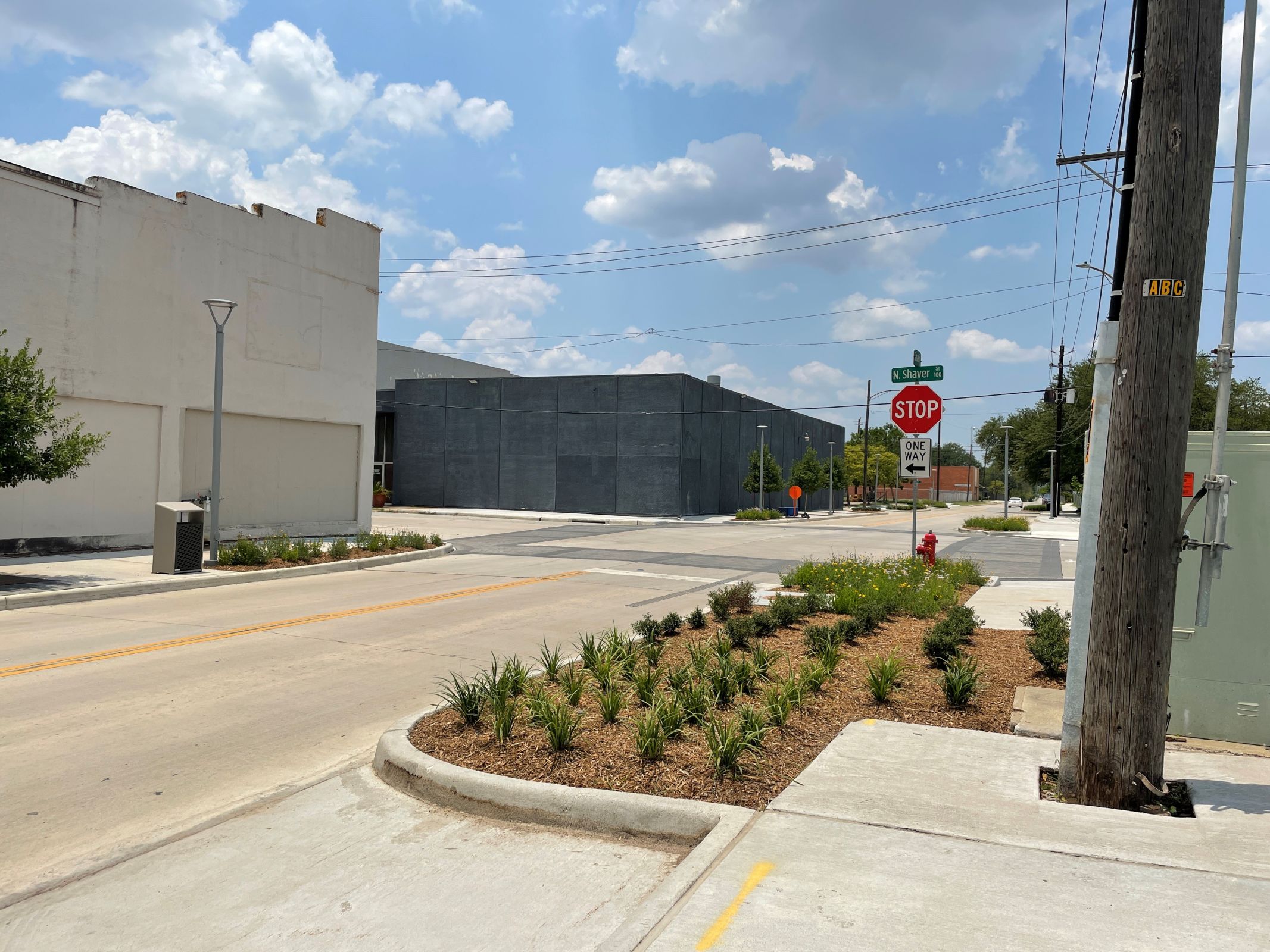Landscaping, sidewalk and parking at intersection of Shaw Ave & Shaver St