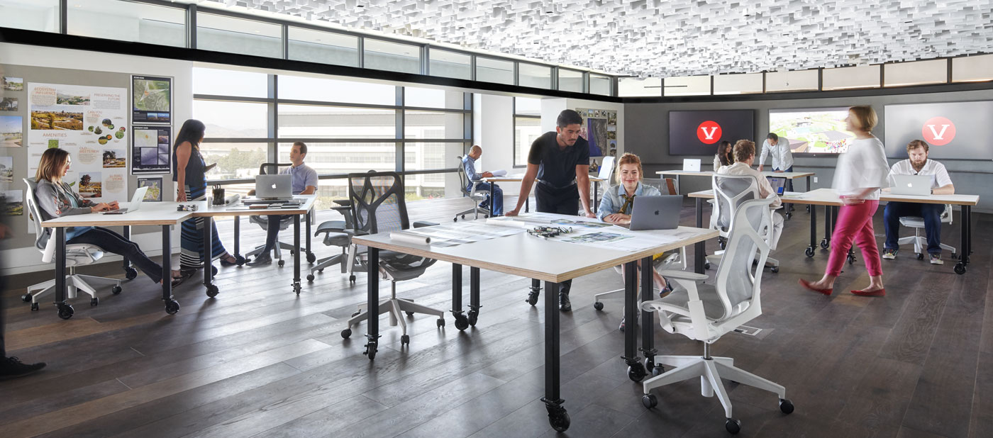 workers in an open office space