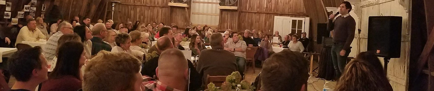 large gathering of people listening to someone speaking in wabash county