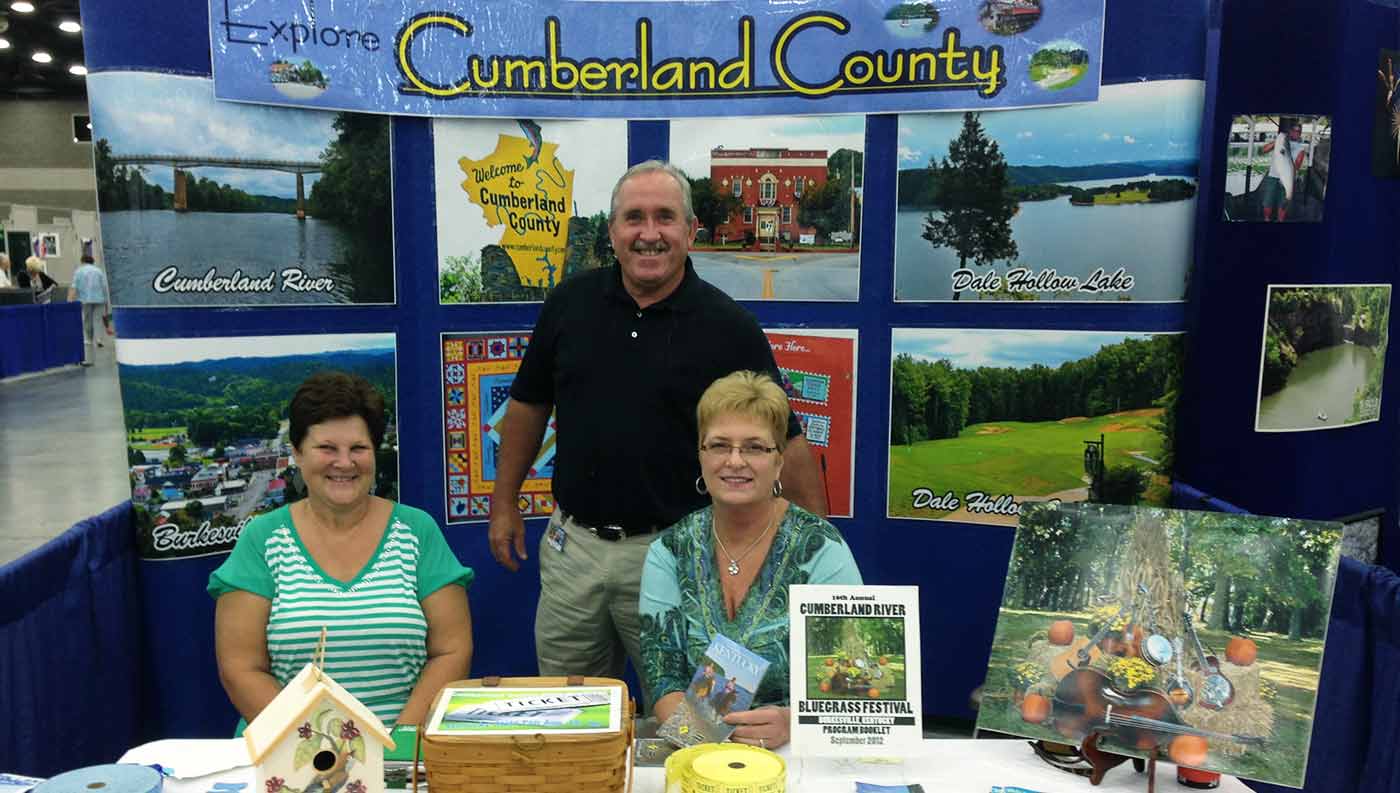 Chamber members at a convention booth
