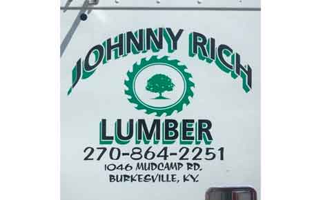 Johnny Rich Lumber Co.'s Logo