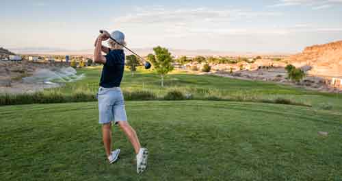 golfer overlooking vista