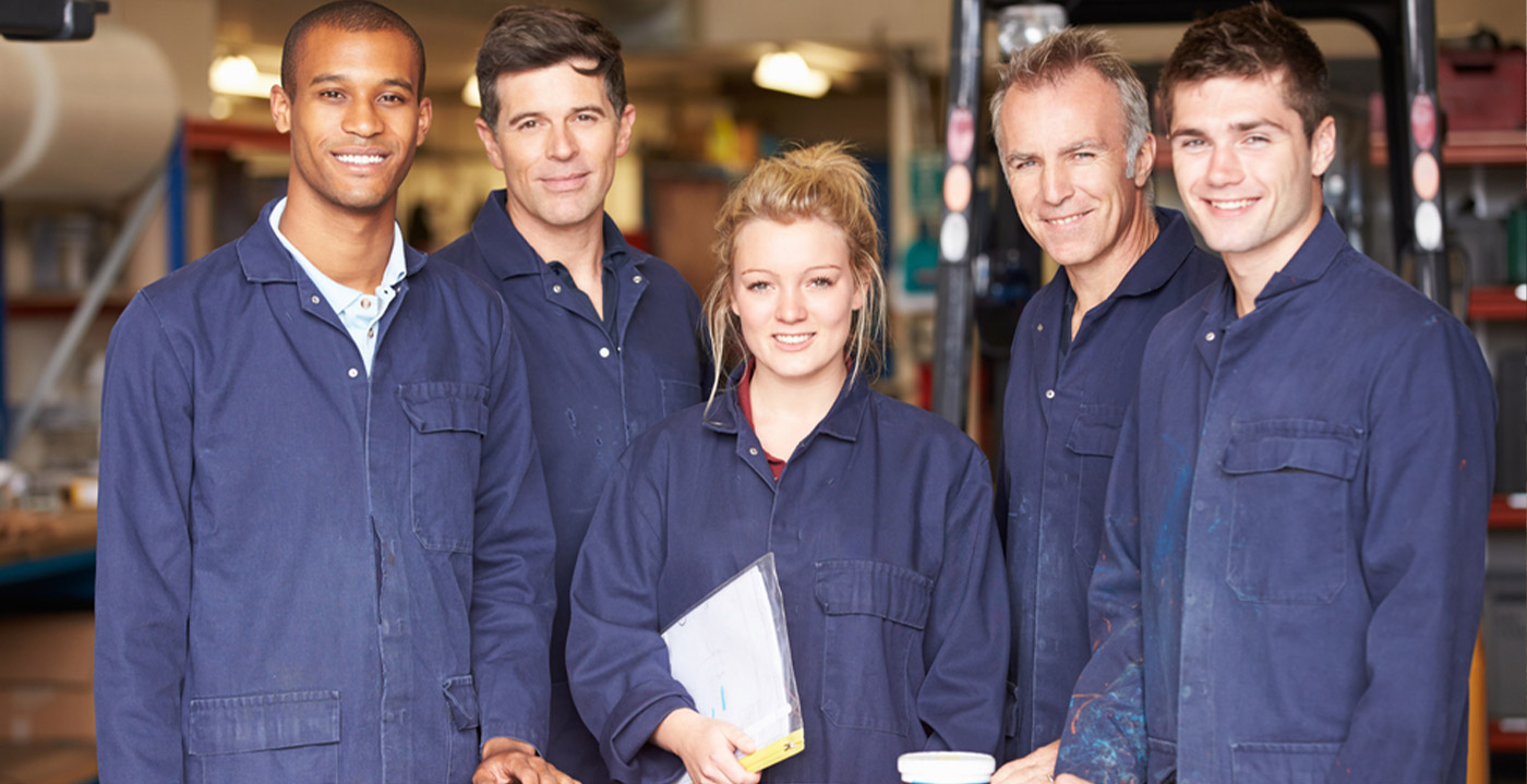 staff standing in an engineering factory