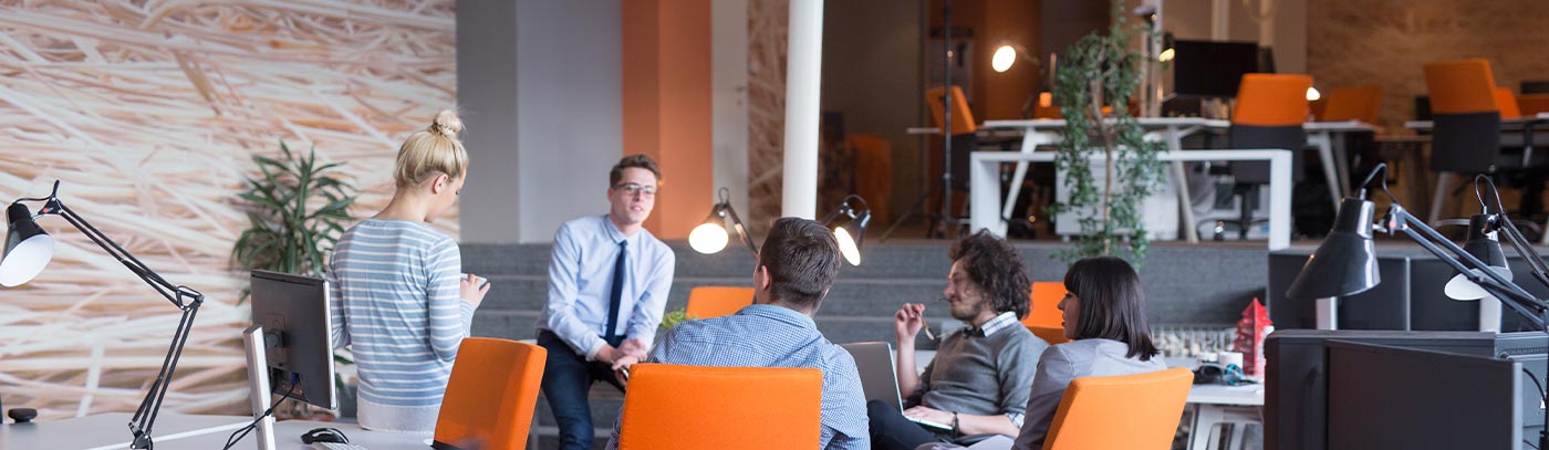 workteam meeting around small office table