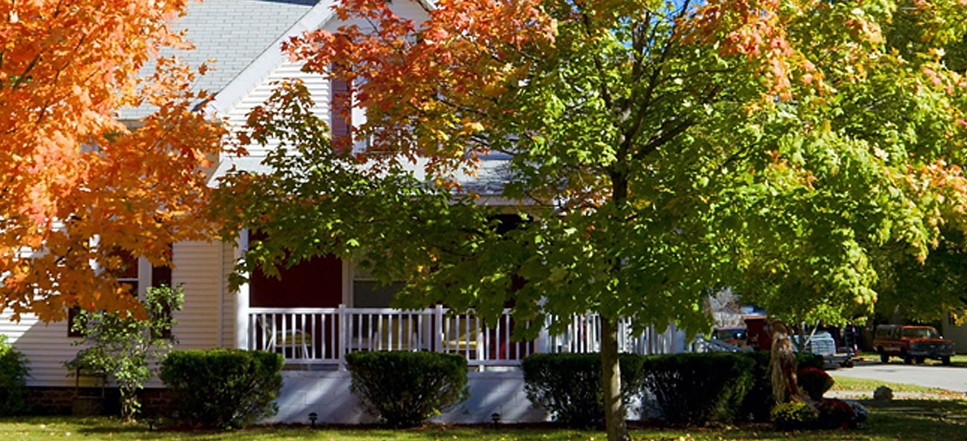 front porch and autumn foliage